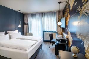 Postel nebo postele na pokoji v ubytování Best Western Hotel Nürnberg am Hauptbahnhof