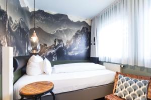 Postel nebo postele na pokoji v ubytování Best Western Hotel Nürnberg am Hauptbahnhof