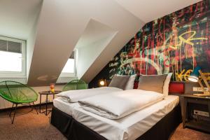 Postel nebo postele na pokoji v ubytování Best Western Hotel Nürnberg am Hauptbahnhof