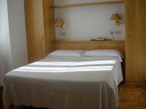 Postel nebo postele na pokoji v ubytování Hotel Tre Re