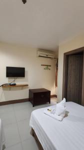 Televisyen dan/atau pusat hiburan di Asia Novo Boutique Hotel - Dumaguete