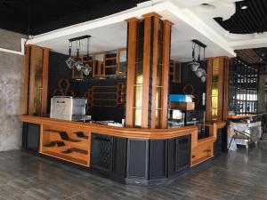 a store with a counter in a room at Hoongthip hotel in Savannakhet