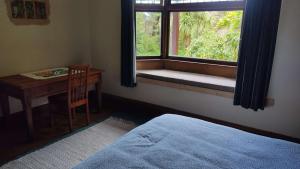 Katil atau katil-katil dalam bilik di The Innlet, Country Apartments and Cottages