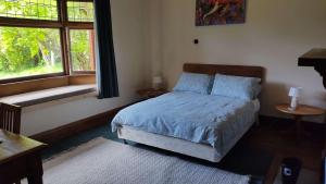 Katil atau katil-katil dalam bilik di The Innlet, Country Apartments and Cottages