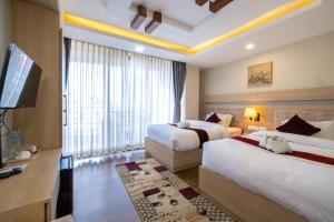 Voodi või voodid majutusasutuse Divine Kathmandu Hotel toas