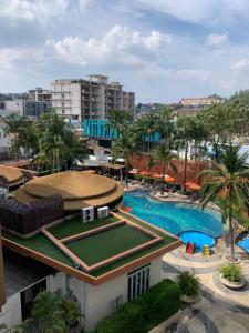 an aerial view of a resort with a swimming pool at Luxury Suite Room by Atlas X in Kata Beach