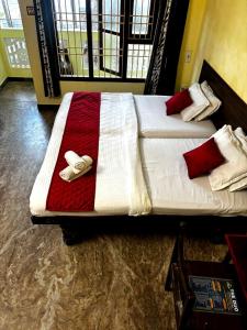 The Muthu Beach Resort客房内的一张或多张床位