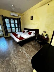 The Muthu Beach Resort客房内的一张或多张床位