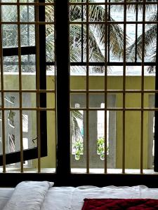 The Muthu Beach Resort客房内的一张或多张床位