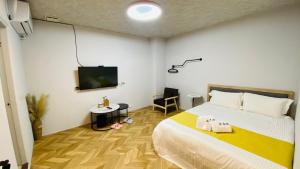 Letto o letti in una camera di 希沐溫泉行旅