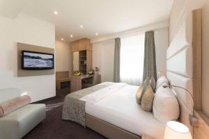 Postel nebo postele na pokoji v ubytování Best Western Hotel Lamm