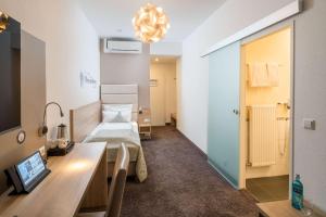 Postel nebo postele na pokoji v ubytování Best Western Hotel Lamm
