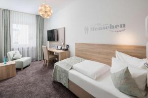 Postel nebo postele na pokoji v ubytování Best Western Hotel Lamm