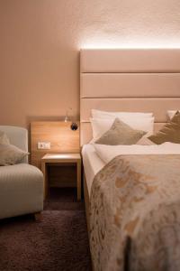Postel nebo postele na pokoji v ubytování Best Western Hotel Lamm