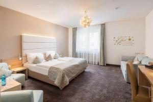 Postel nebo postele na pokoji v ubytování Best Western Hotel Lamm + 37 fotografií