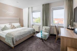 Postel nebo postele na pokoji v ubytování Best Western Hotel Lamm