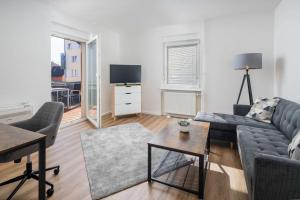 TV a/nebo společenská místnost v ubytování Best Western Hotel Lamm