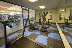 a room with a gym with a treadmill at Baymont by Wyndham Hannibal in Hannibal