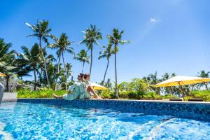 Bazén v ubytování Waldorf Astoria Seychelles Platte Island nebo v jeho okolí
