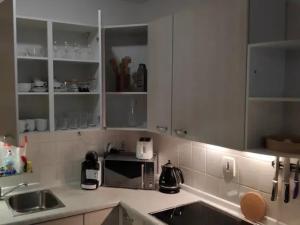 Kuchyňa alebo kuchynka v ubytovaní Apartman 404