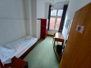 Postel nebo postele na pokoji v ubytování Die Fabrik - Hostel