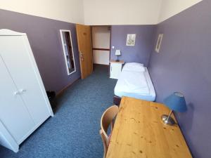 Postel nebo postele na pokoji v ubytování Die Fabrik - Hostel