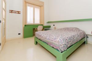 Letto o letti in una camera di Brenta Flat
