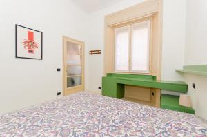Letto o letti in una camera di Brenta Flat