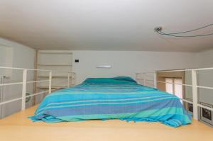 Letto o letti in una camera di Brenta Flat