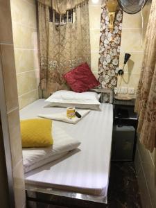 Giường trong phòng chung tại Ranjeet Guest house