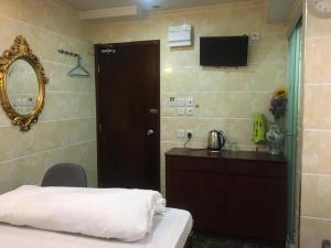 Giường trong phòng chung tại Ranjeet Guest house