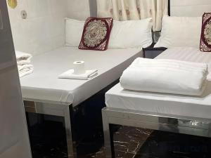 Giường trong phòng chung tại Ranjeet Guest house