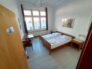 Postel nebo postele na pokoji v ubytování Die Fabrik - Hostel
