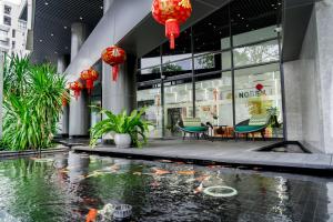 Bazén v ubytování Noden Hotel & Apartment nebo v jeho okolí