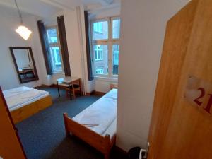 Postel nebo postele na pokoji v ubytování Die Fabrik - Hostel