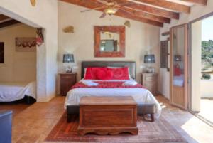 Ein Bett oder Betten in einem Zimmer der Unterkunft Cortijo Cuscurro
