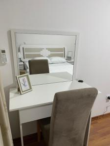 Postel nebo postele na pokoji v ubytování pazaric residence