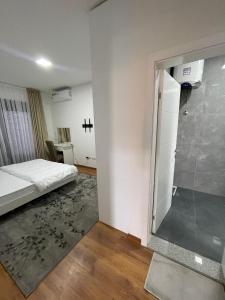 Postel nebo postele na pokoji v ubytování pazaric residence