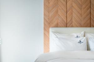 Postel nebo postele na pokoji v ubytování Oceanstay Hotel