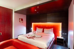 Кровать или кровати в номере Fahrenheit Hotels & Resorts