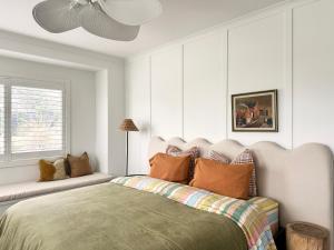 a bedroom with a bed and a window at Luxury house, close to weddings! in Worragee