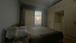 Postelja oz. postelje v sobi nastanitve No AC - Vintage Modernized Sea View Apartment