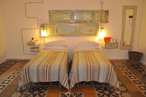 Postel nebo postele na pokoji v ubytování Zuppetta16 Apartments