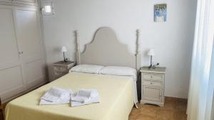 Postel nebo postele na pokoji v ubytování Villa Áncora
