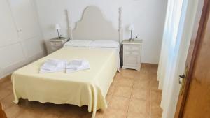 Postel nebo postele na pokoji v ubytování Villa Áncora