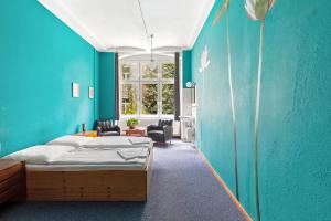 Postel nebo postele na pokoji v ubytování Die Fabrik - Hostel
