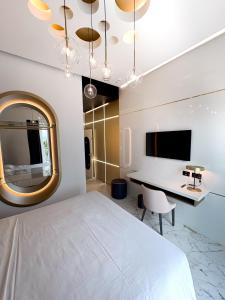 TV a/nebo společenská místnost v ubytování Hotel Nautilus Excelsior - Adults Only