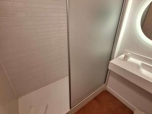 a bathroom with a shower and a sink at ibis Styles Toulon Centre Port in Toulon