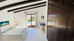 Postel nebo postele na pokoji v ubytování Villa Bini Kim + 37 fotografií