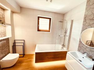 Kúpeľňa v ubytovaní Apartament Rybical + 10 fotografií